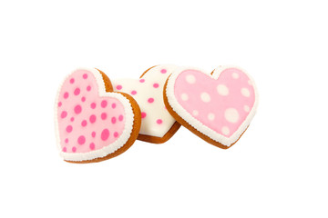 background from pink cookies heart shaped with different patterns, isolated