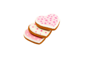 background from pink cookies heart shaped with different patterns, isolated