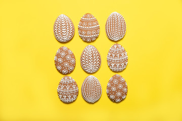 Easter cookies on a yellow background. Place for text. Easter eggs.