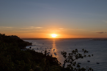 Fototapeta na wymiar View of wonderful sunset in Morro de Sao Paulo, Bahia, Brazil. Hill.