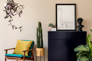 Interior design of retro modern living room with black mock up poster frame, blue navy commode, a lot of plants, cacti design armchair and elegant personal accessories. Stylish home decor. Template.