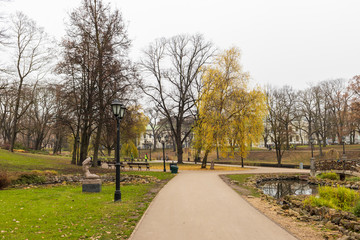 park in Riga with a canal and a bridge