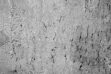 Texture of a metal wall with cracks and scratches which can be used as a background