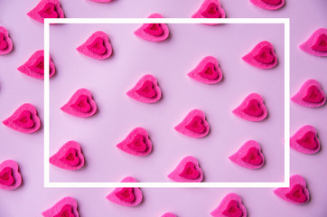 Pink hearts on a pink background, frame, pattern