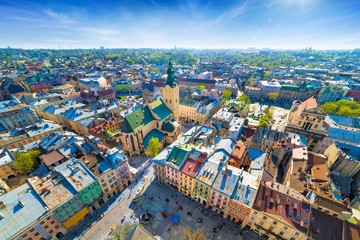 Fototapeta premium Wide angle aerial view of colourful houses in historical old district of Lviv, Ukraine