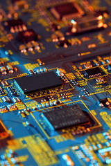 Electronic circuit board with electronic components such as chips close up. The concept of the...