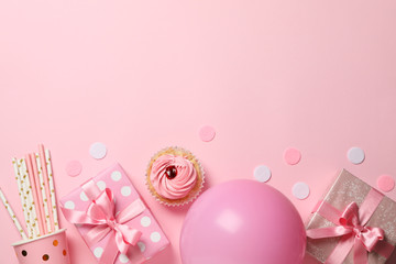Composition with gift boxes and balloon on pink background, space for text