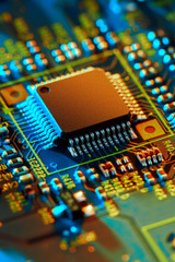 Electronic circuit board with electronic components such as chips close up. The concept of the...