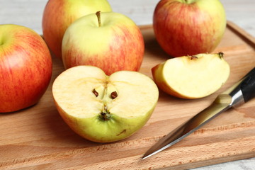 Naklejka na ściany i meble Apples on cutting board