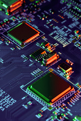 Electronic circuit board with electronic components such as chips close up. The concept of the electronic computer hardware technology.