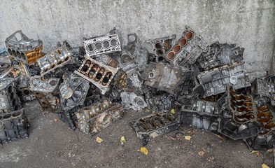 Stack of aluminium alloy cylinder head for recycling. . Scrap engines parts for recycling.
