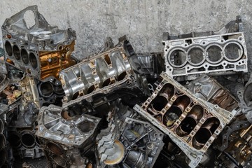 Stack of aluminium alloy cylinder head for recycling. . Scrap engines parts for recycling.