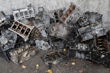 Stack of aluminium alloy cylinder head for recycling. . Scrap engines parts for recycling.
