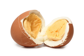 Broken brown hard boiled eggs with shell. Isolated with clipping path. Macro.
