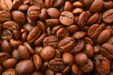 Naklejka premium Roasted coffee beans texture close up background