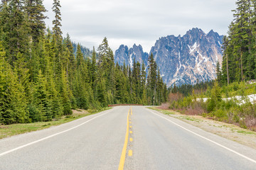 Fototapeta na wymiar Rocky Mountains. Mountain Road in Cascades National Park, Washington, USA.
