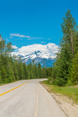 Fototapeta na wymiar Rocky Mountains. Mountain Road in Alberta, Canada.