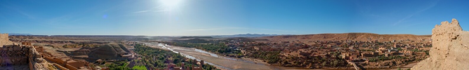 Bright landscape of Morocco, breathtaking curves of mountains, stunning combination of hills & farm land,inadvertent distribution of houses & huts, raw impression of pure nature.