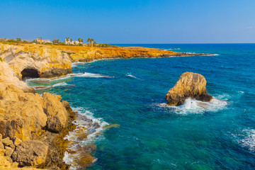 Obraz premium View to sea cave and stone cliffs near 