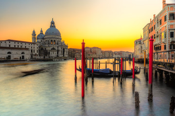 Naklejka premium Sunset on Grand Canal and Basilica of Santa Maria della Salute, Venice, Italy 