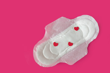 women intimate hygiene products - sanitary pads and tampon on pink background.  Feminine hygiene pad.  hygiene during menstruation. women critical days, gynecological menstruation cycle
