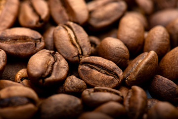 Coffee beans close-up background. Fresh roasted