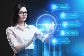 Business, Technology, Internet and network concept. Young businessman working on a virtual screen of the future and sees the inscription: Automation