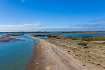 Pagham Beach and harbour aerial view on a fine winters day.
