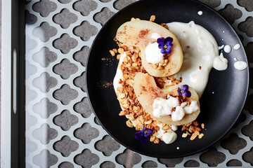 Poached pear with yogurt  and granola.