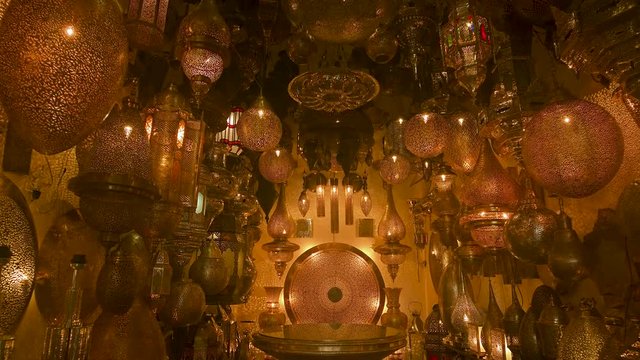 Traditional Colorful Handmade in Marrakech lanterns market, Mosaic Lanterns of Colored Glass on the Market. Arabic lamps. Souvenirs east light decoration bazzar. moeoccan night market.