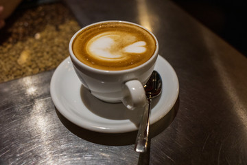 coffee in a white cup on the table