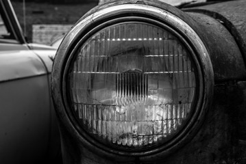 Headlights of an old classic car 402