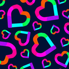 Valentines day background. Hearts pattern. Colorful neon hearts on dark backdrop. Design of fashion romantic wrapping paper.