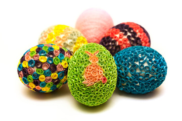 Easter eggs decorated with quilling on white background. Easter symbol, holiday, celebration, springtime