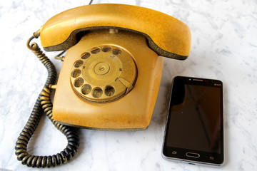 old telephone on white background
