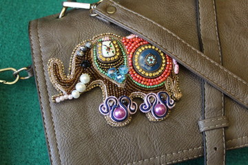 It is fashionable to wear brooches on clothes, on bags - everywhere