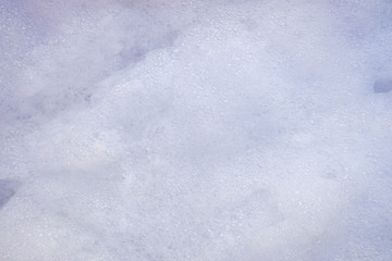 Obraz premium White foam of an isolated soap to use as a background.