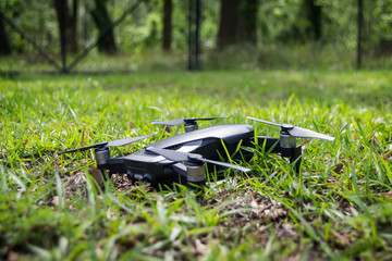 Grounded black remote drone