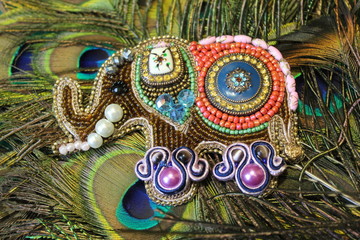It is fashionable to wear brooches on clothes, on bags - everywhere