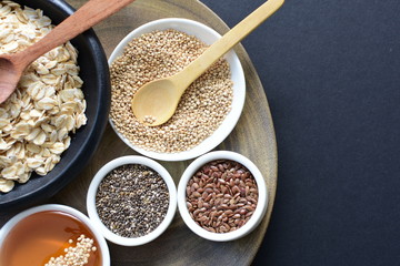 Natural oatmeal on light wooden background