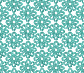 Crochet irish lace seamless pattern. The canvas is knitted with blue yarn.