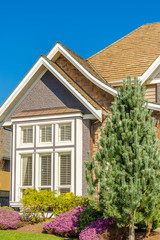 The roof of the house with nice window.