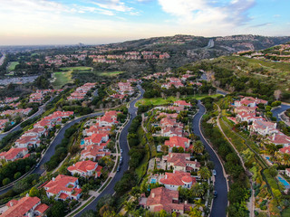  Crystal Cove neighborhood community in the Newport coast before sunset. Luxury big villa with pool on the cove.