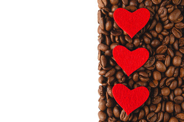 Roasted Coffee beans with red hearts. One side white for text  Flat lay. Greeting Card.