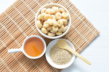 Quinoa cereal, accompanied by seeds and honey