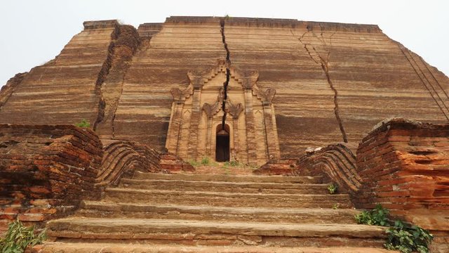 Ancient Traditional Burmese Temple. Travel Vacation Asian Nature Concept. 4K Slow Motion Steadycam Footage. Mandalay, Myanmar.