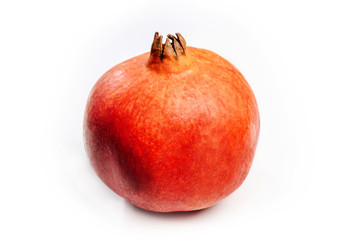 Big red pomegranate on a white background.