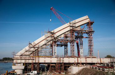 Fototapeta na wymiar Bridge under construction over Danube river near Novi Sad