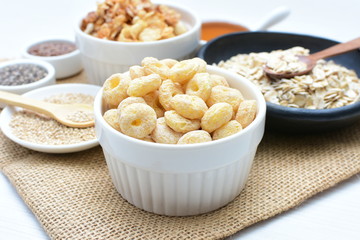 Quinoa cereal, accompanied by seeds and honey