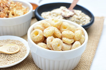 Quinoa cereal, accompanied by seeds and honey